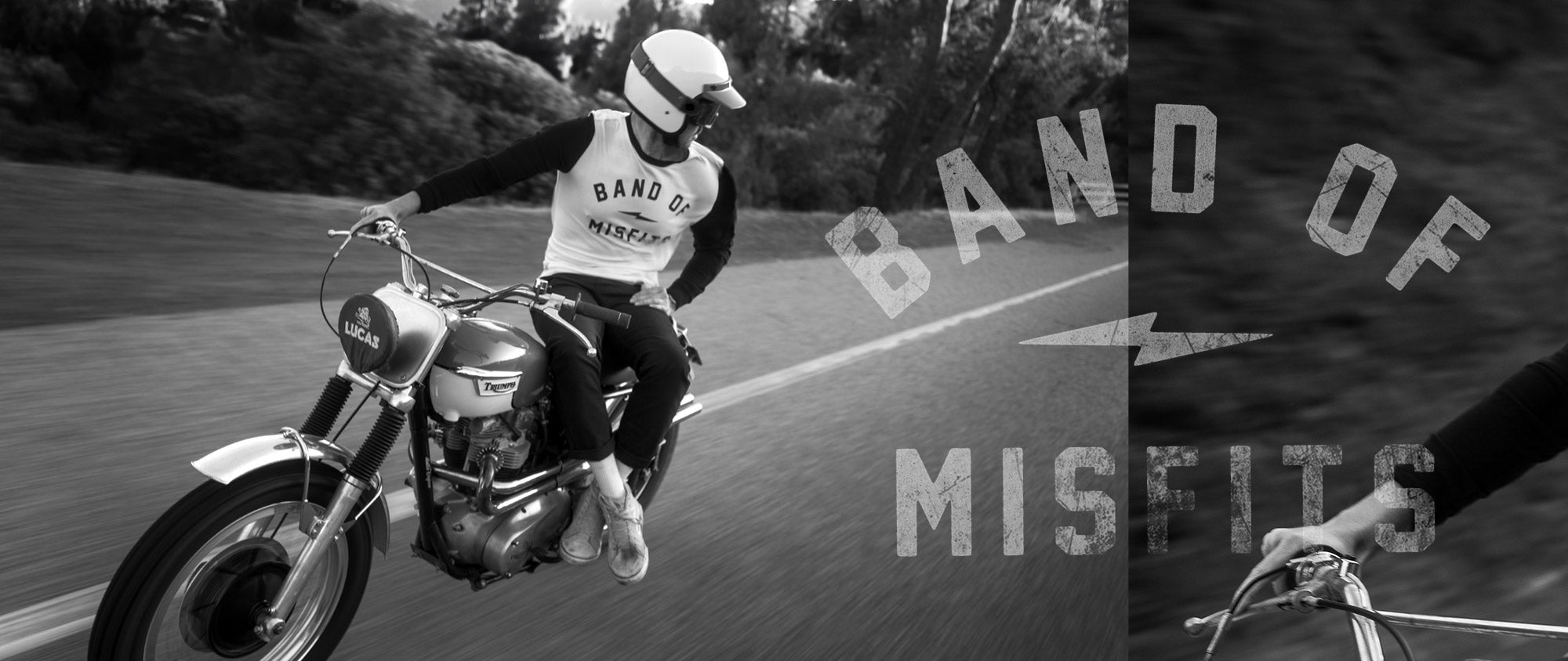 Person riding a motorcycle with 'Band of Misfits' branding on clothing and graphics.